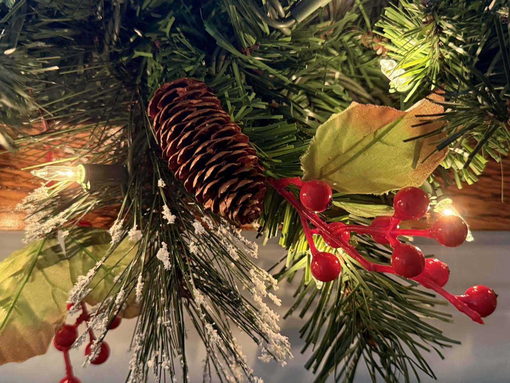 National Tree Company 9ft Pre-Lit Wintry Pine Flocked Artificial Christmas Garland | 100 Clear Lights, 184 Tips, Artificial Christmas Decoration With Pinecones, Red Berries, Green customer photo 1
