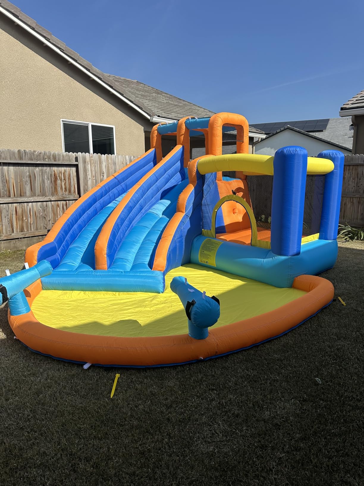 Inflatable Water Slide Bounce House, Slide Bouncer Castle Playhouse with Splash Pool, Jump Area, Climbing Wall, Basketball Hoop, 450W Air Blower for Kids Backyard Indoor Outdoor Use, Free Water Gun customer photo 1