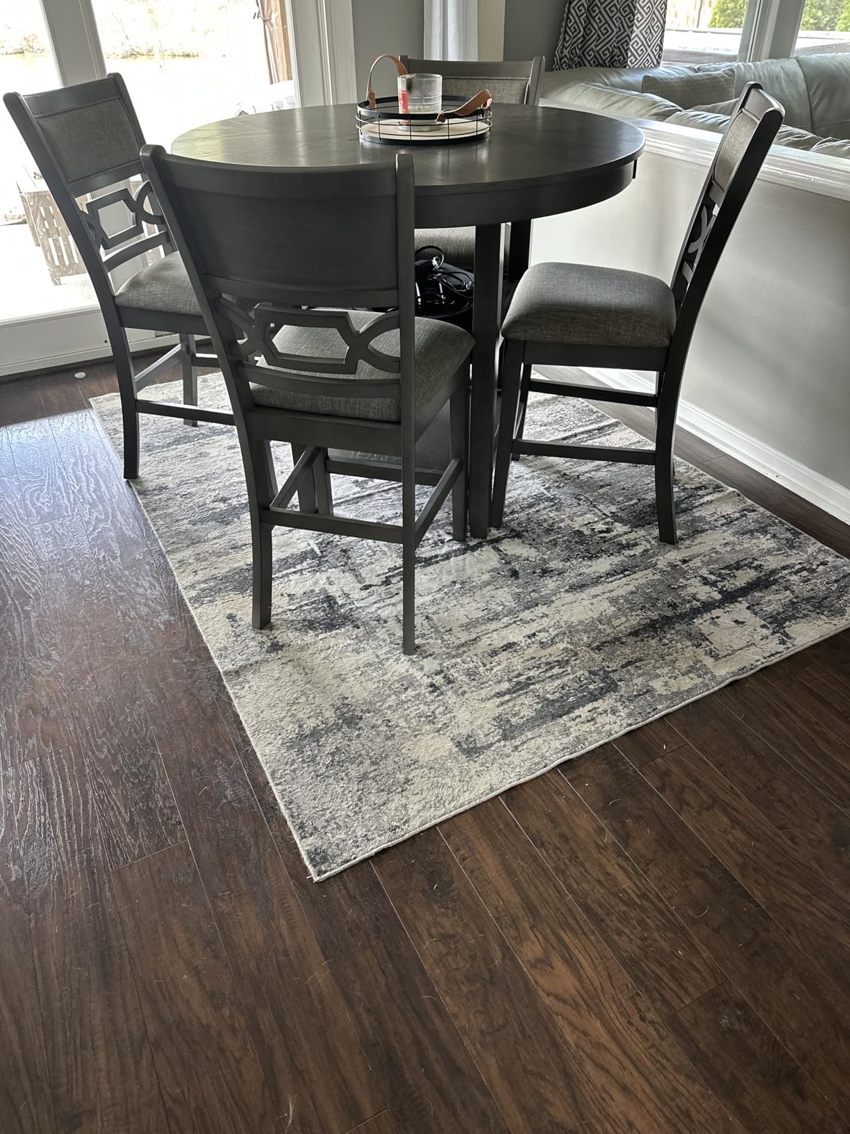 Signature Design by Ashley 5-Piece Round Counter Height Dining Set, Gray | 42-inch round dining table with 2 storage shelves, 4 upholstered bar stools, Wrenning Series customer photo 1