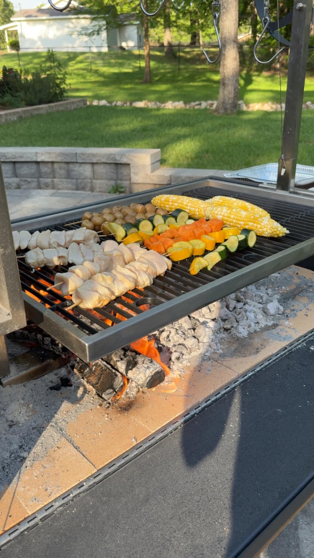 Backyard Discovery Argentine Santa Maria XL Wood Fire & Charcoal Steel BBQ Grill with Asado Clamp, Adjustable Grill Grates, Brasero, Fire Bricks, S-Hooks, Acacia Wood Table for Outdoor Gaucho Grilling customer photo 2