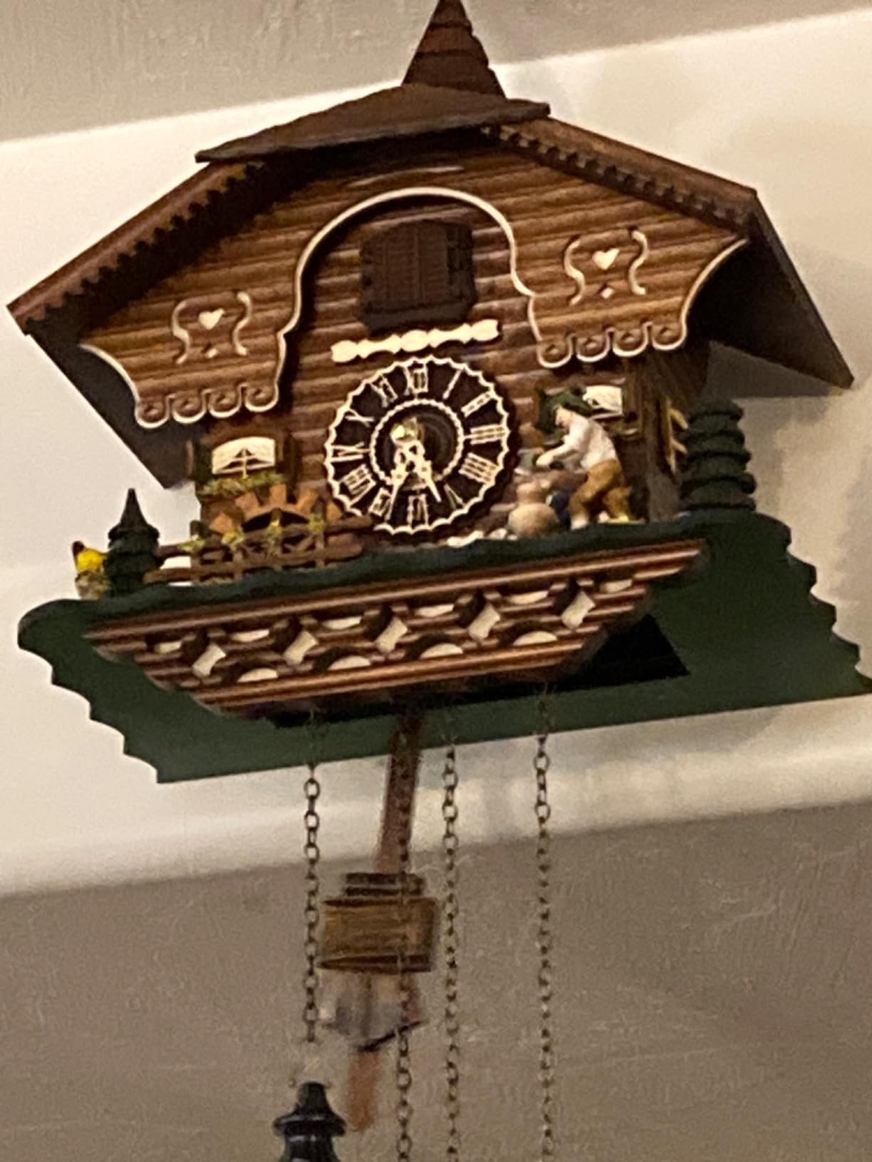 Trenkle Quartz Cuckoo Clock Black Forest House with Moving Wood Chopper and Mill Wheel, with Music TU 4217 QM customer photo 1