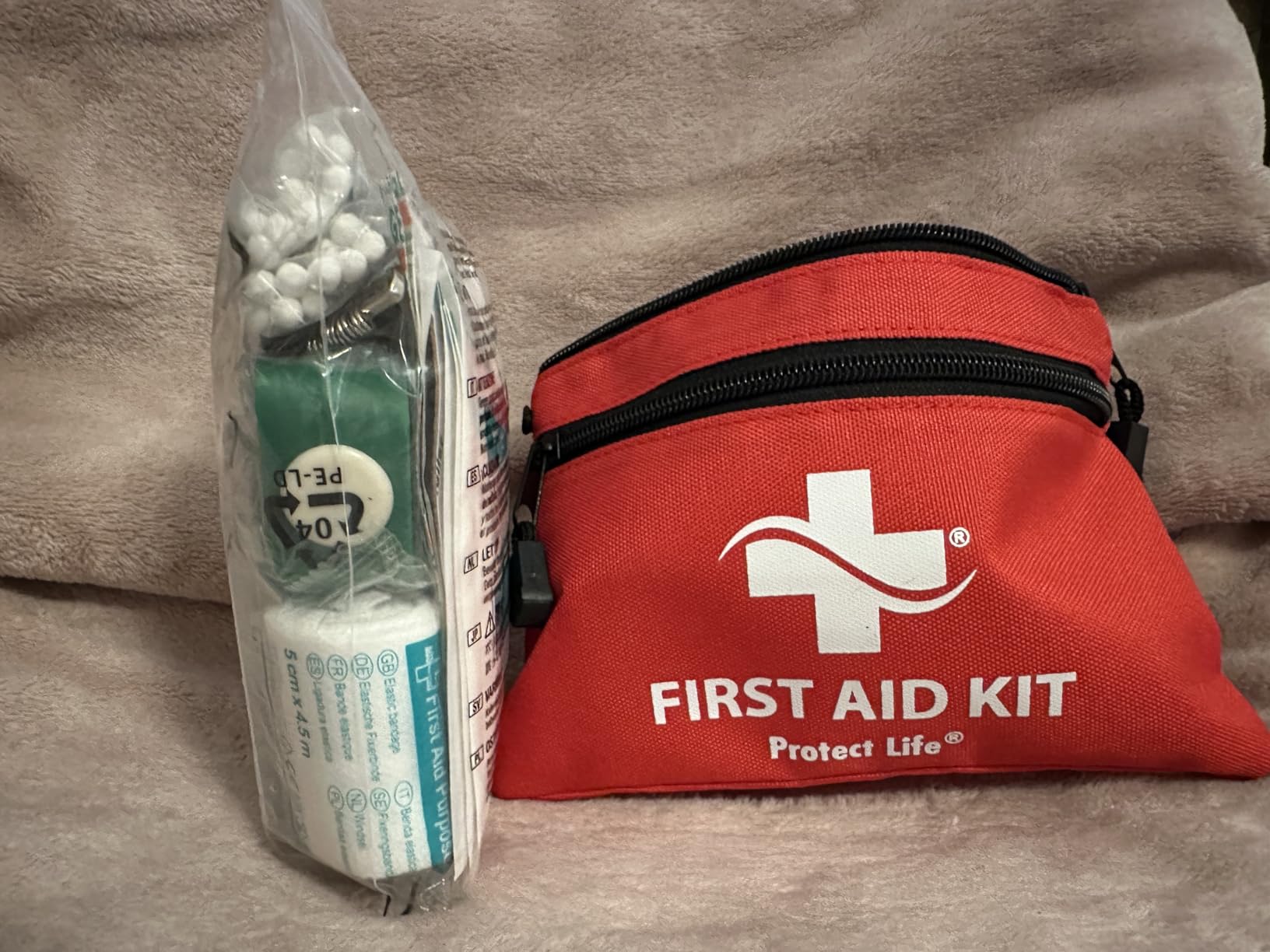 Protect Life Travel First Aid Kit for Car - Small Mini Emergency Kit, 100 Piece Waterproof First Aid Kit for Home, Camping, Boat & Hiking - Includes Emergency Blanket & First Aid Guide customer photo 2