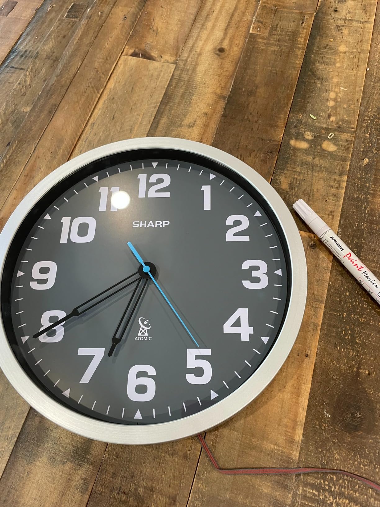Sharp 12-Inch Atomic Wall Clock, Battery Operated, Glow in Dark | Self-setting atomic time; Easy-read analog face; Automatic time adjustment; Simple setup; Versatile home or office style customer photo 2