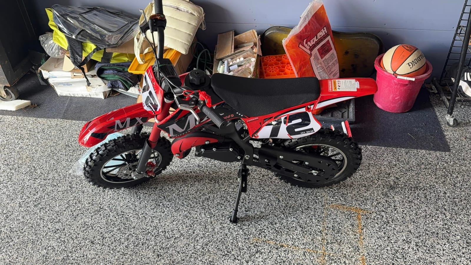 Kids Dirt Bike 50cc Gas Powered 2-Stroke, Mini Dirt Bike with Inverted Front Fork, Dual Hydraulic Disc Brakes, 24 MPH Max Speed, 19 Mile Range, Easy Pull Start, Off Road Pit Bike for Kids, Red customer photo 1