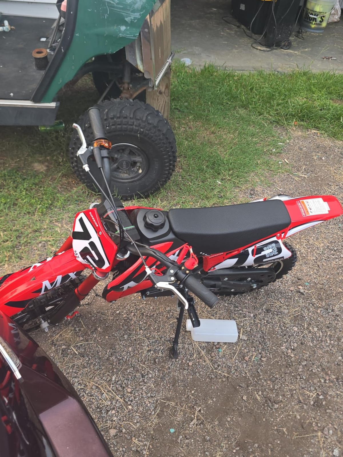 Kids Dirt Bike 50cc Gas Powered 2-Stroke, Safety-First Mini Dirt Bike, Dual Hydraulic Disc Brakes, Stable Full Suspension, Lightweight Frame, 24 MPH, Pull Start, Blue customer photo 1